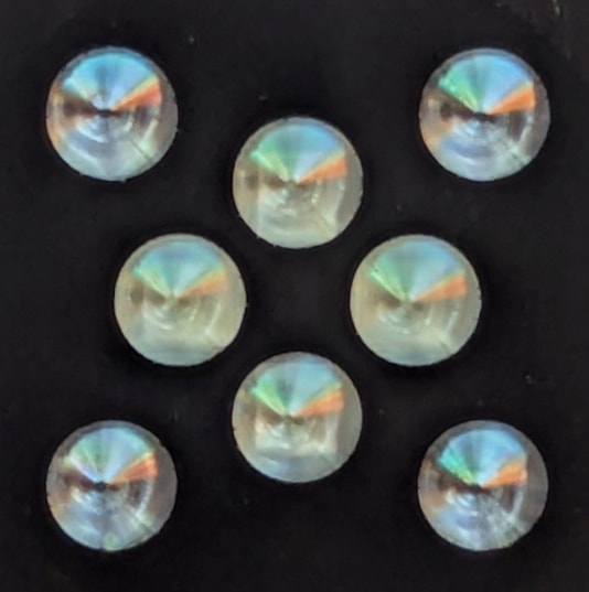 Close-up of the 4-LED + 4-PD heart rate sensor array on the back of the Xiaomi Watch S4 41mm