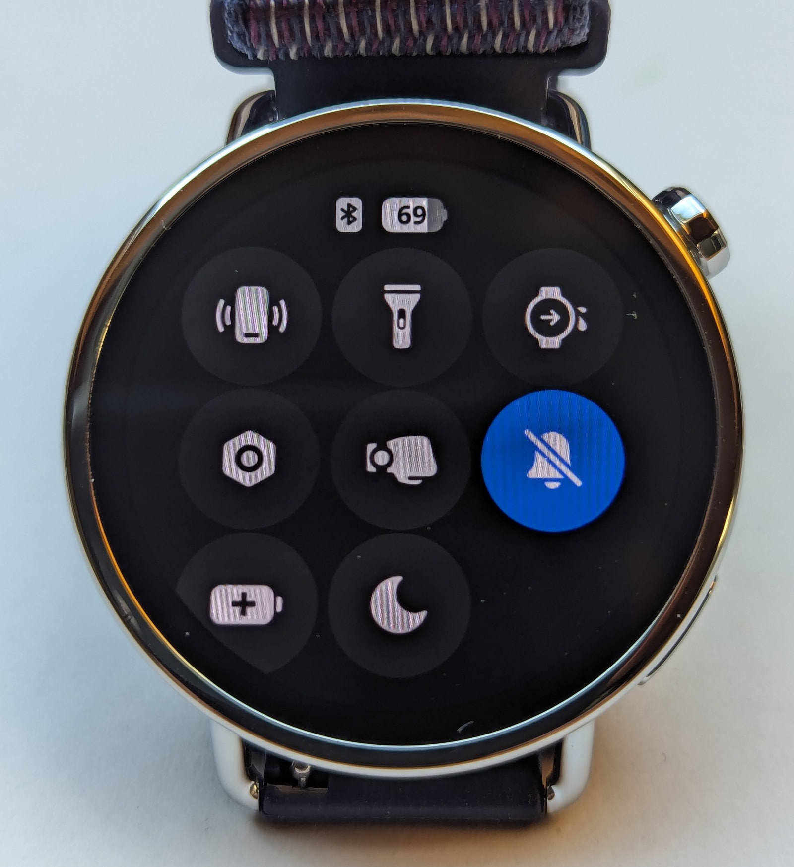 The quick settings menu on the Xiaomi Watch S4 41mm, providing easy access to Do Not Disturb and battery settings